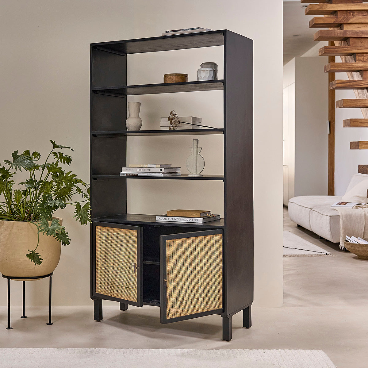 BLAISE - Bibliothèque haute en manguier massif noire et cannage, H 170 cm